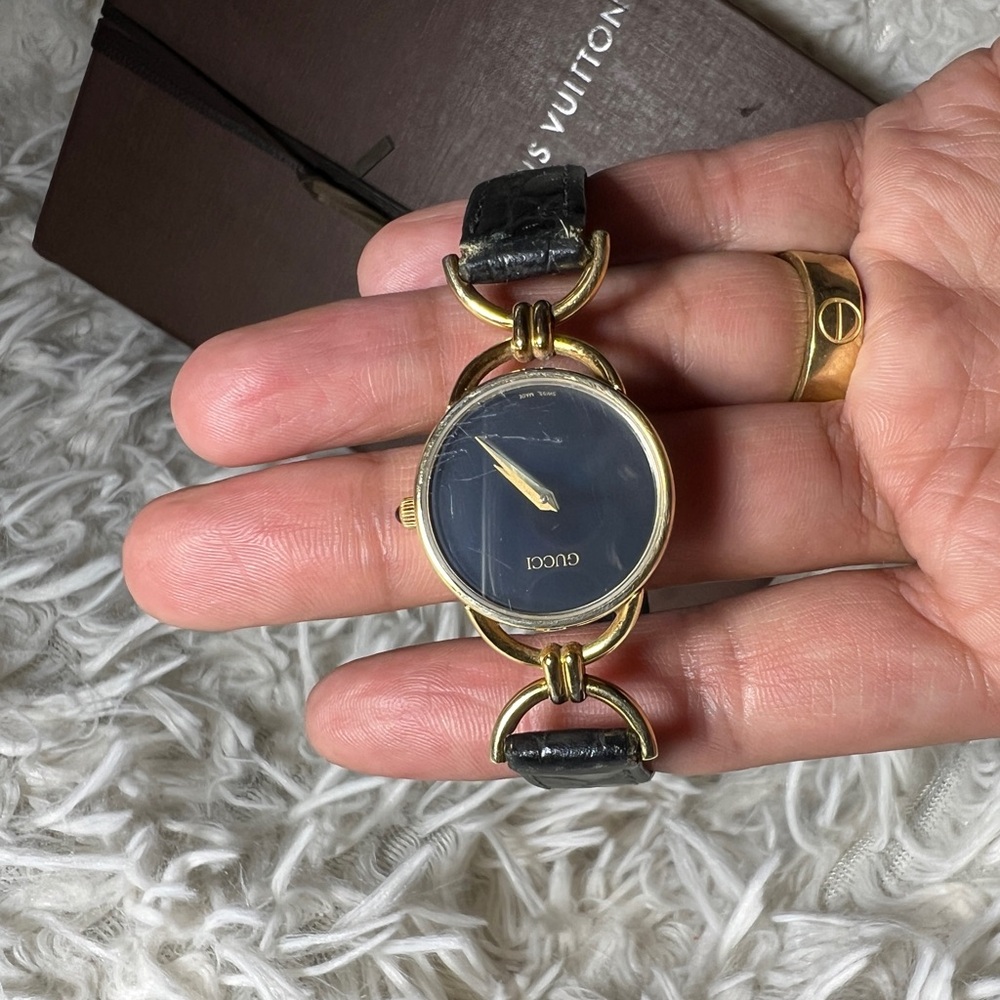 Gucci Black and Gold Watch